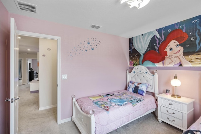 bedroom with light carpet