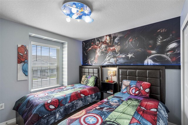 bedroom featuring a textured ceiling