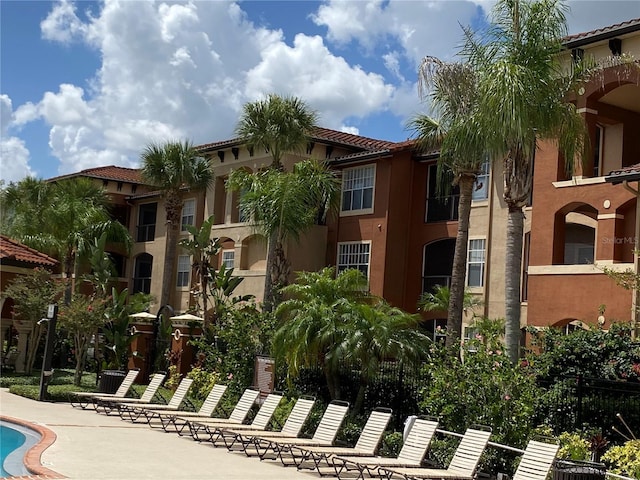 5578 Metrowest Blvd Unit 107, Orlando, FL 32811 - view of property featuring a community pool