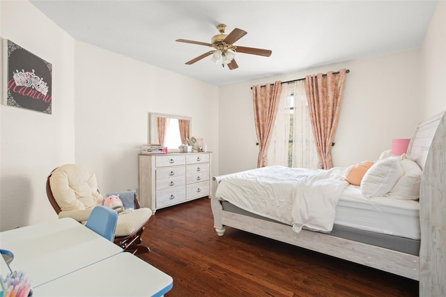 bedroom featuring dark wood-type flooring and ceiling fan