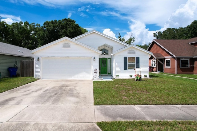 ranch-style house with a front lawn, driveway, and an attached garage