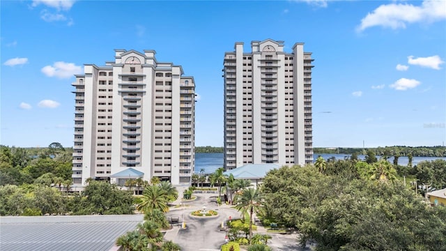 13427 Blue Heron Beach Dr Unit 405, Orlando, FL 32821 - view of building exterior with a water view
