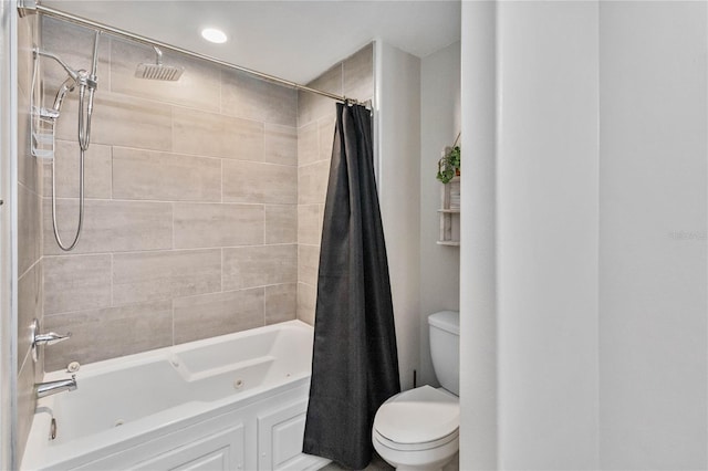 bathroom featuring toilet and shower / bath combo with shower curtain