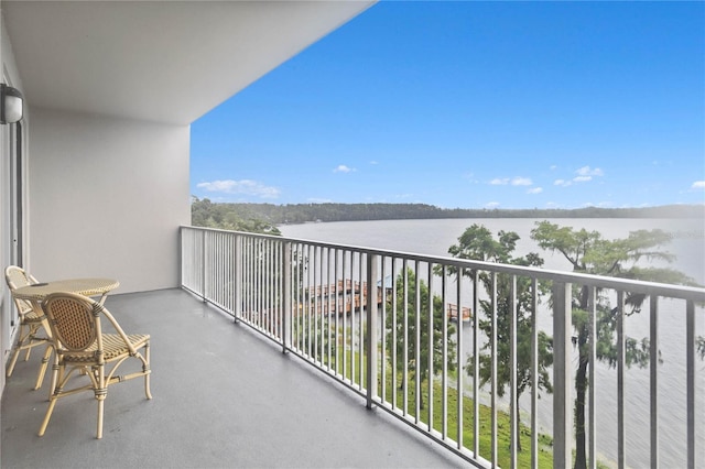 balcony featuring a water view