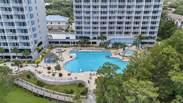 view of swimming pool featuring a patio area