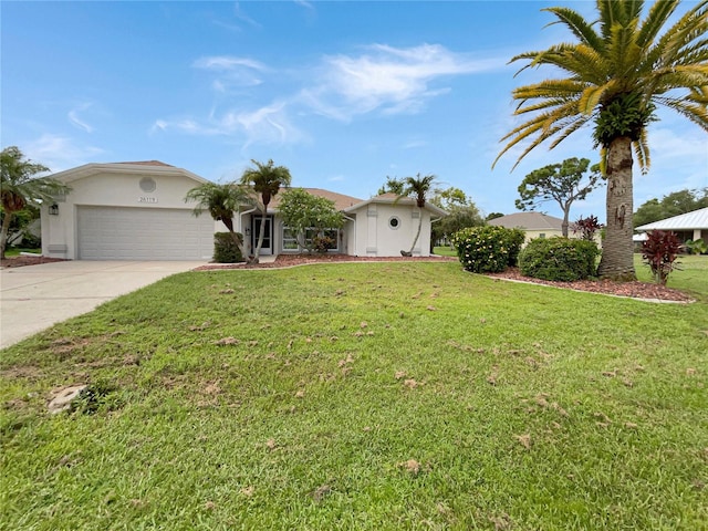 single story home with a garage and a front yard