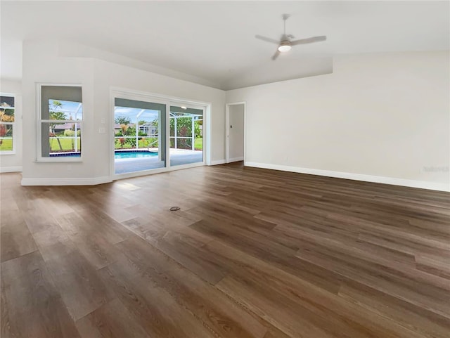 unfurnished room featuring dark hardwood / wood-style floors and ceiling fan