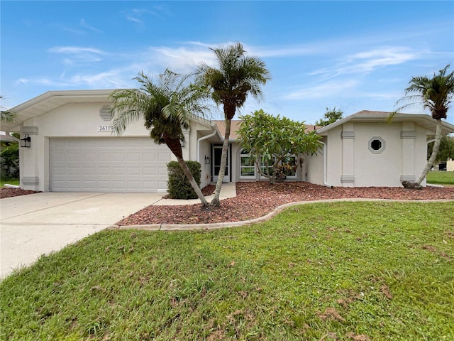 single story home with a garage and a front yard