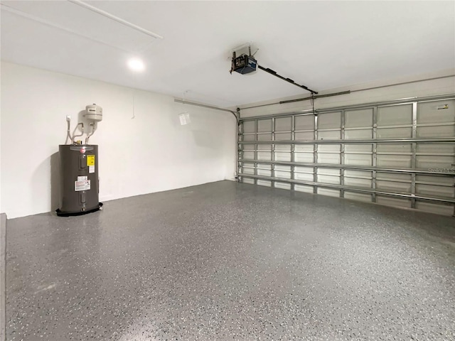 garage with water heater and a garage door opener