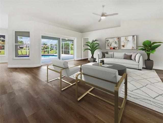 living room featuring ceiling fan, vaulted ceiling, and hardwood / wood-style floors