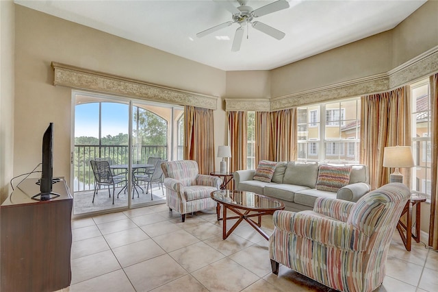 tiled living room featuring ceiling fan