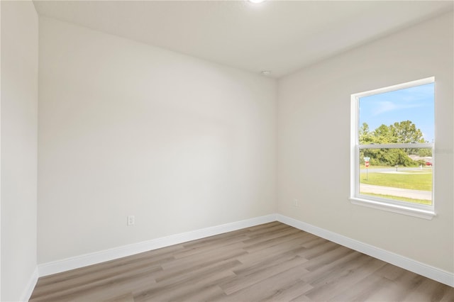 empty room with light wood-type flooring