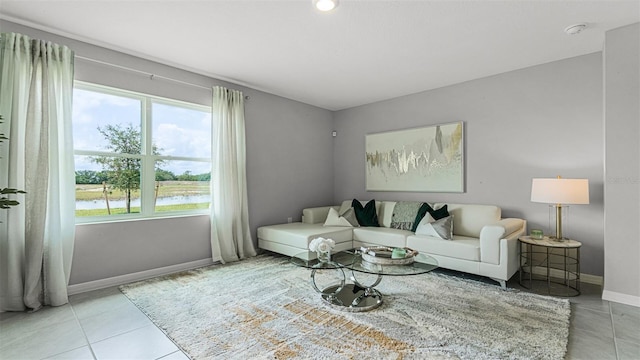 tiled living room with plenty of natural light