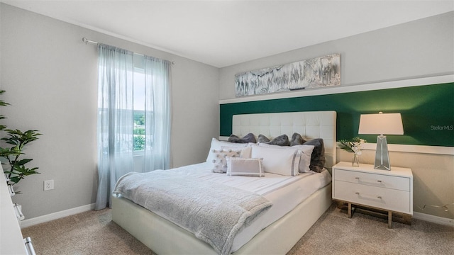 bedroom with light colored carpet