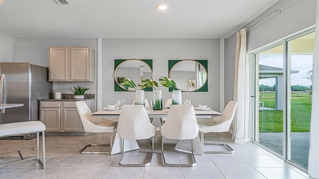 view of tiled dining space