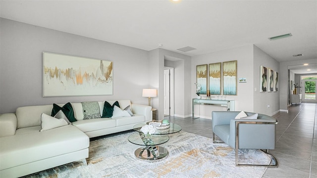 living room featuring tile patterned floors