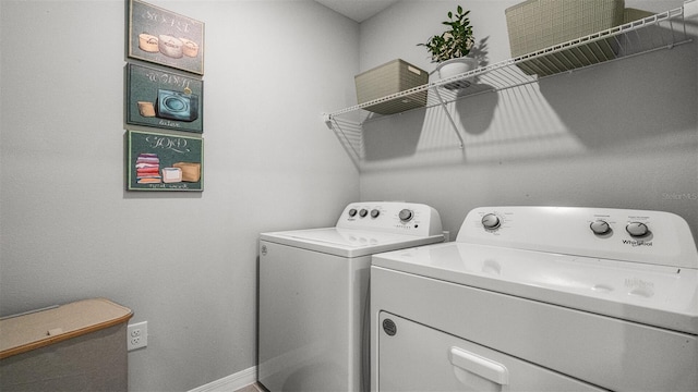 3907 Botancial Ct, Sanford, FL 32773 - washroom featuring separate washer and dryer and baseboards