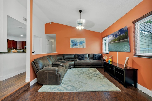 701 Castlewood Dr, Winter Springs, FL 32708 - living room featuring dark wood-type flooring, ceiling fan, and vaulted ceiling
