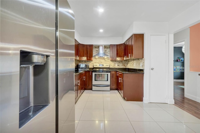701 Castlewood Dr, Winter Springs, FL 32708 - kitchen featuring wall chimney exhaust hood, stainless steel appliances, light tile patterned floors, and backsplash
