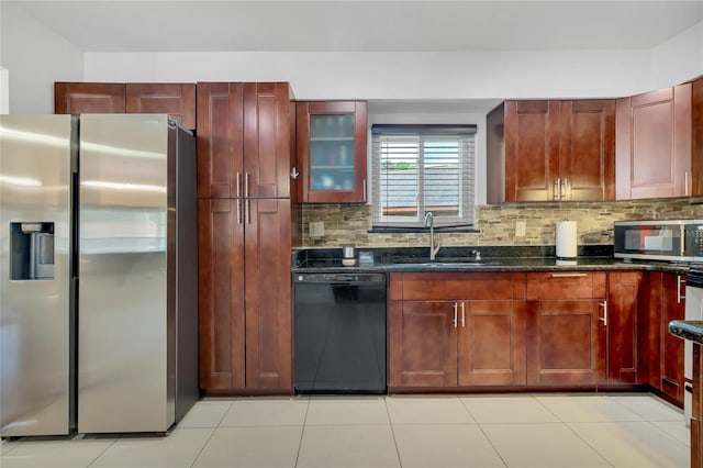 701 Castlewood Dr, Winter Springs, FL 32708 - kitchen with sink, decorative backsplash, stainless steel appliances, and dark stone counters