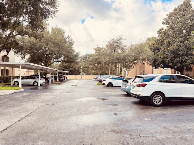 view of parking featuring a carport