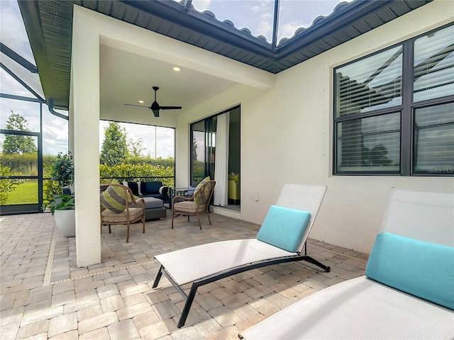 view of patio / terrace with an outdoor hangout area and a ceiling fan