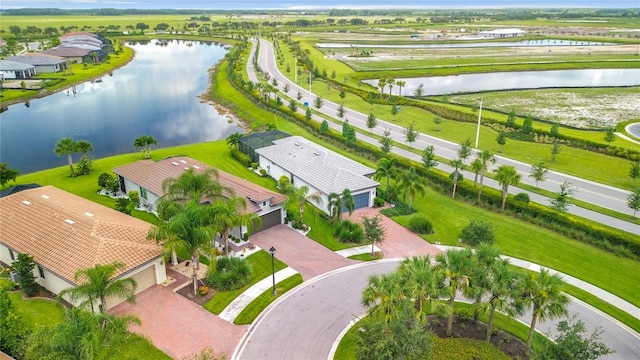 aerial view featuring a residential view and a water view