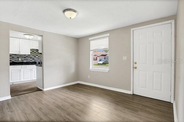 interior space with hardwood / wood-style flooring