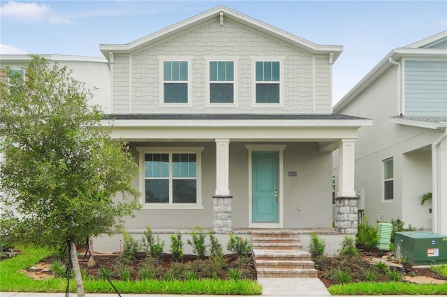 view of front of property featuring covered porch