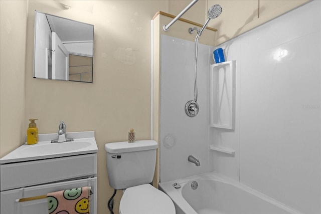 full bath with bathtub / shower combination, vanity, and toilet