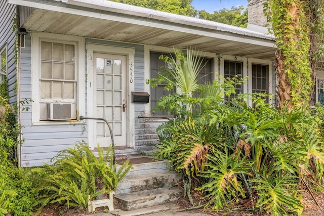 property entrance featuring cooling unit