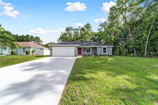 single story home with a garage and a front yard