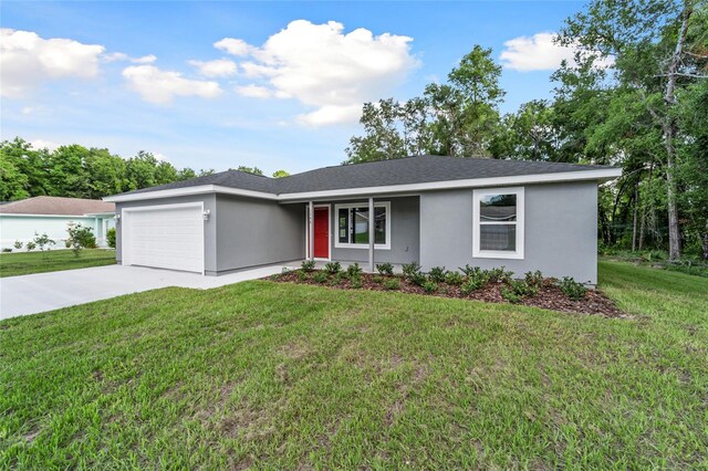 ranch-style house with a garage and a front yard