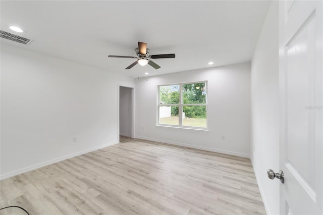 unfurnished room with light hardwood / wood-style floors and ceiling fan