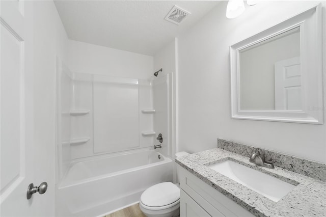 full bathroom with vanity, shower / bathing tub combination, hardwood / wood-style flooring, and toilet