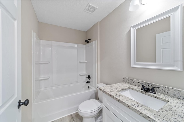 full bathroom featuring vanity, wood-type flooring, shower / bath combination, toilet, and a textured ceiling