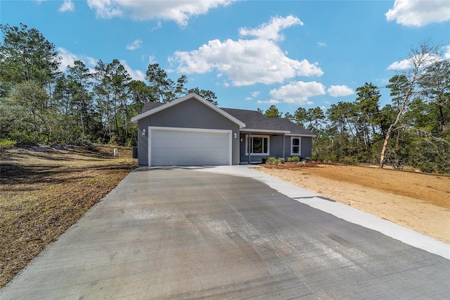 ranch-style house featuring a garage