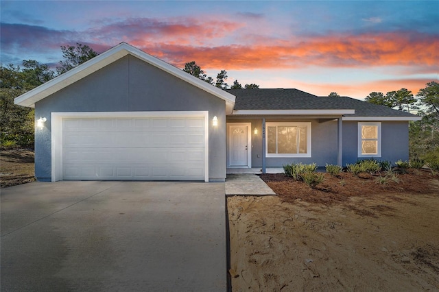 single story home with a garage