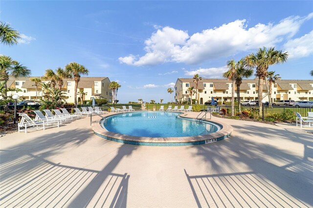 view of pool with a patio area