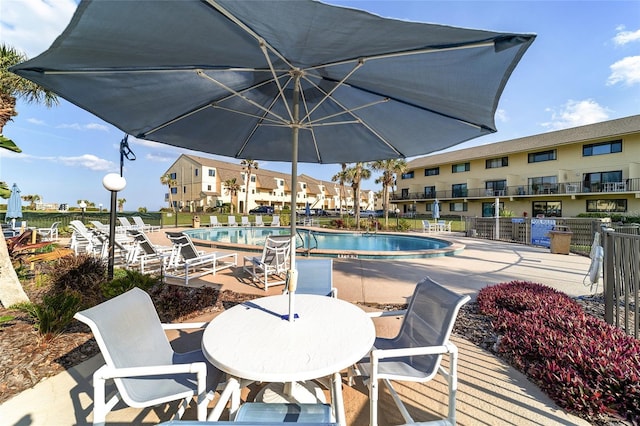 8550 A1A S Unit 34242, Saint Augustine, FL 32080 - community pool with fence and a patio area