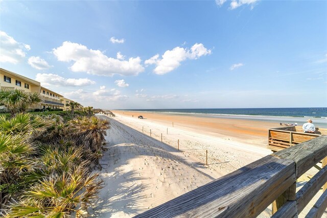 property view of water featuring a view of the beach