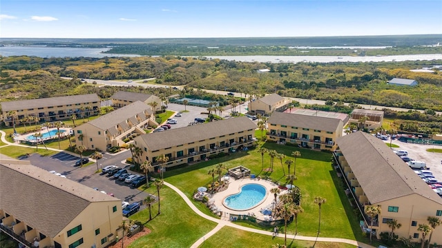 drone / aerial view with a water view