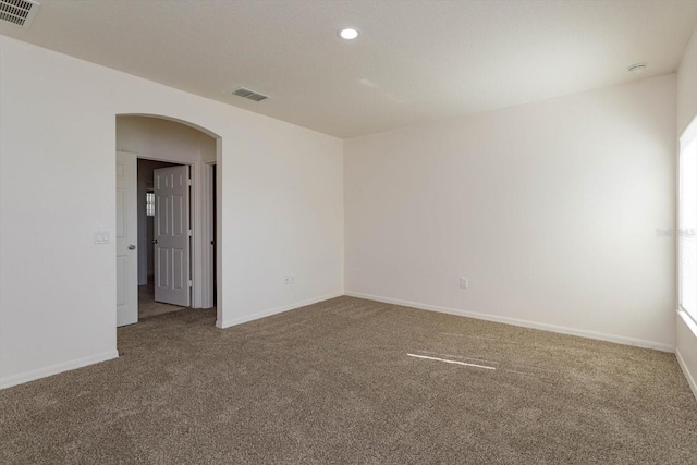 view of carpeted spare room