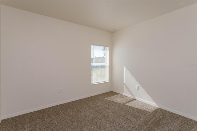 empty room with carpet floors