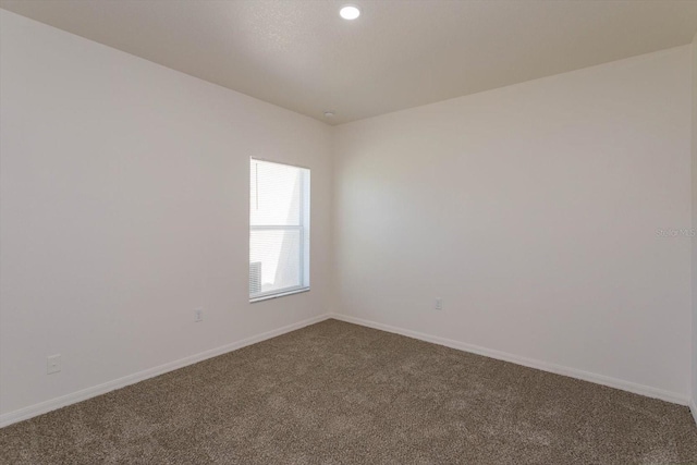 empty room with carpet floors