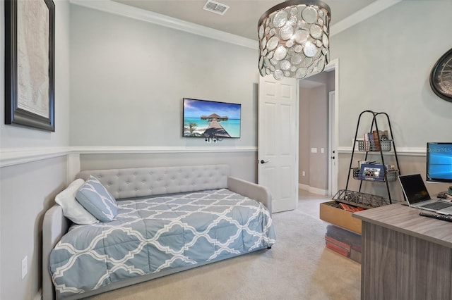 carpeted bedroom featuring crown molding