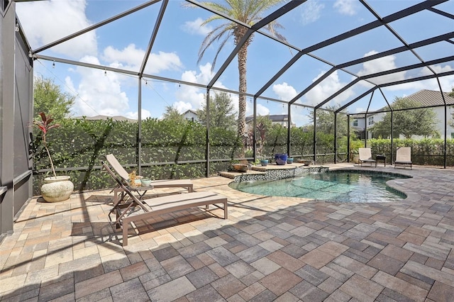 view of pool featuring a patio and a lanai