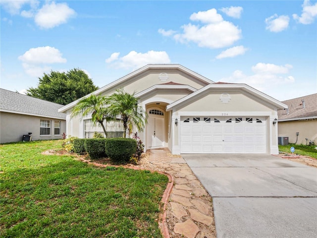 single story home featuring a garage, central AC, and a front yard