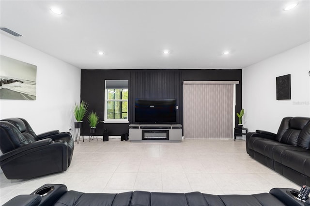 781 Marion Oaks Trl, Ocala, FL 34473 - living area featuring light tile patterned floors, an accent wall, visible vents, and recessed lighting