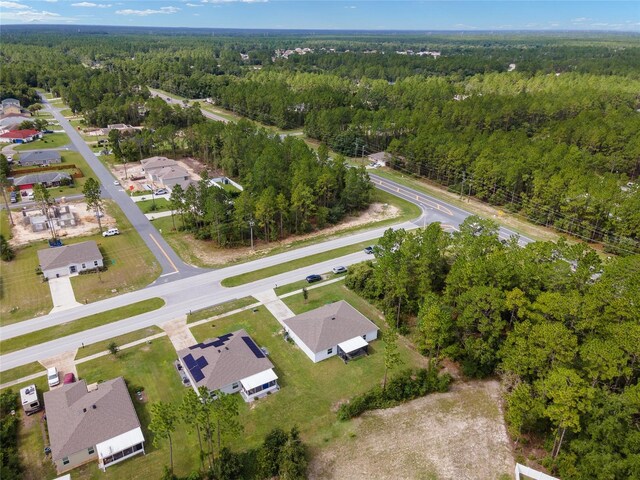 781 Marion Oaks Trl, Ocala, FL 34473 - drone / aerial view featuring a view of trees and a residential view